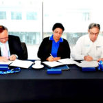 Tom Hall, Chairman of the Florida Aquarium Foundation; Maria de los Angeles, director of the National Aquarium of Cuba; and Thom Stork, President and Chief Executive Officer (CEO) of the Florida Aquarium, signing historic agreement to protect the Coral Reefs of the Gulf of Mexico. 2016.